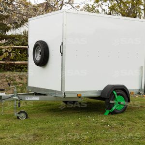 Wheel clamp on a tall, boxed trailer